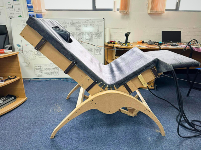 Meshed massage chair - London School of Massage reasearch and developement